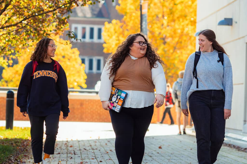 three BSSW students walking on university of tennessee campus