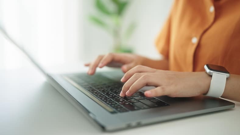 student working on laptop