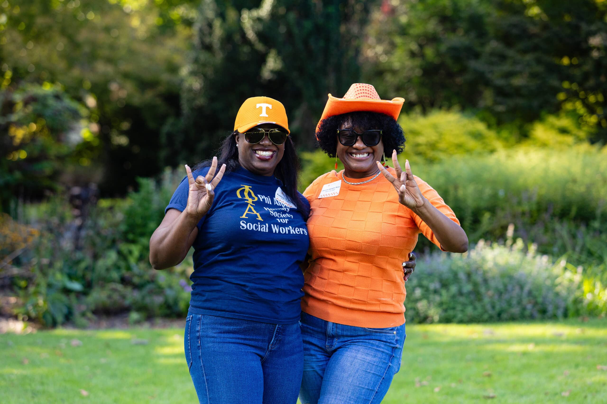 phi alpha honor society student posing for a picture with Javonda Williams Moss at the CSW welcome back event in the university of tennessee gardens
